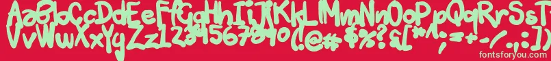 Tuschtouch3-Schriftart – Grüne Schriften auf rotem Hintergrund