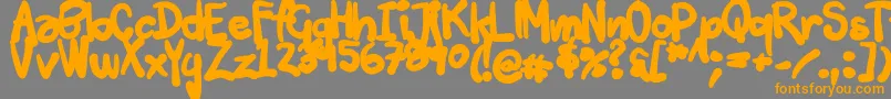 フォントTuschtouch3 – オレンジの文字は灰色の背景にあります。