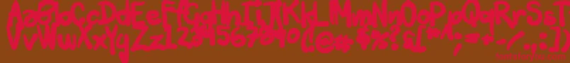 フォントTuschtouch3 – 赤い文字が茶色の背景にあります。