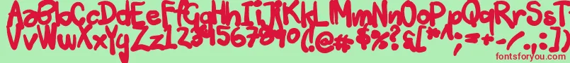 Tuschtouch3-Schriftart – Rote Schriften auf grünem Hintergrund
