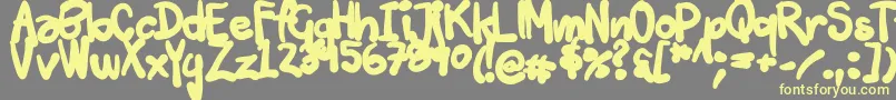 Tuschtouch3-Schriftart – Gelbe Schriften auf grauem Hintergrund