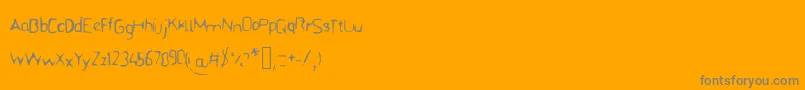 Czcionka Bfstencil – szare czcionki na pomarańczowym tle