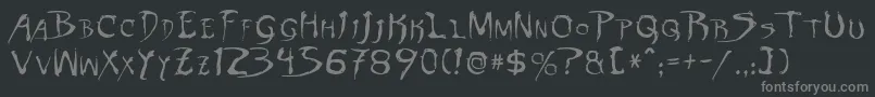 フォントDinobotsNormal – 黒い背景に灰色の文字