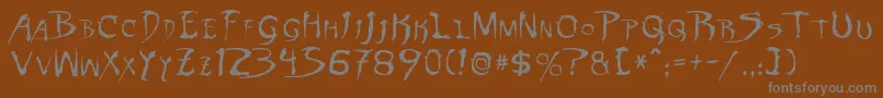 フォントDinobotsNormal – 茶色の背景に灰色の文字