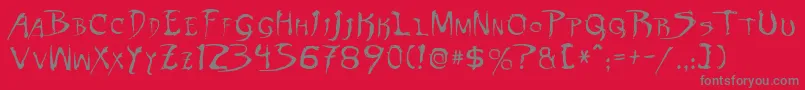 Czcionka DinobotsNormal – szare czcionki na czerwonym tle