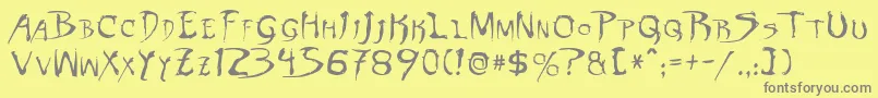 フォントDinobotsNormal – 黄色の背景に灰色の文字