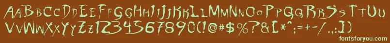 フォントDinobotsNormal – 緑色の文字が茶色の背景にあります。