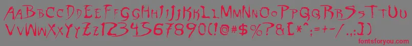 DinobotsNormal-Schriftart – Rote Schriften auf grauem Hintergrund