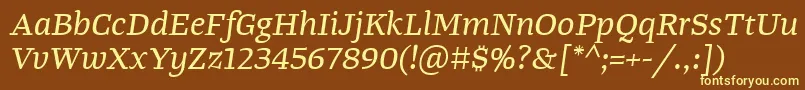 TangerserifwideItalic-fontti – keltaiset fontit ruskealla taustalla