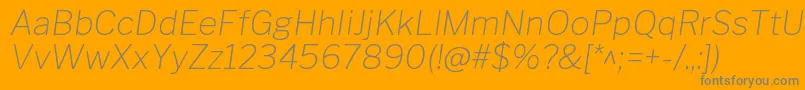 フォントLibrefranklinThinitalic – オレンジの背景に灰色の文字