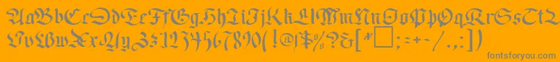 OldGermenDb-Schriftart – Graue Schriften auf orangefarbenem Hintergrund