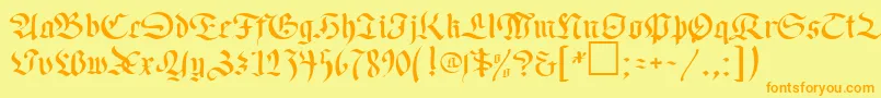 フォントOldGermenDb – オレンジの文字が黄色の背景にあります。