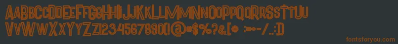 Pineappleboldinline-fontti – ruskeat fontit mustalla taustalla