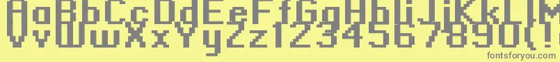 フォントStandard0966 – 黄色の背景に灰色の文字