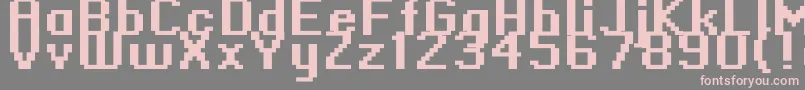 フォントStandard0966 – 灰色の背景にピンクのフォント