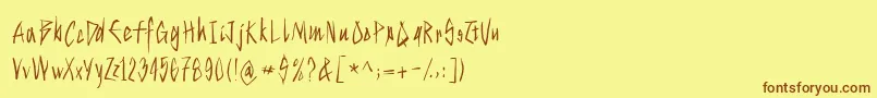 フォントStrokeyhand – 茶色の文字が黄色の背景にあります。