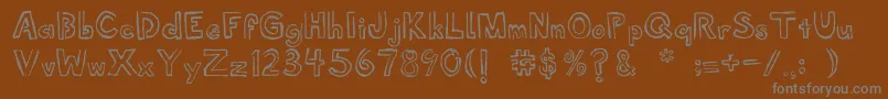 Shellmuseum Font – Gray Fonts on Brown Background