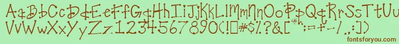 DesireesCoolDots Font – Brown Fonts on Green Background