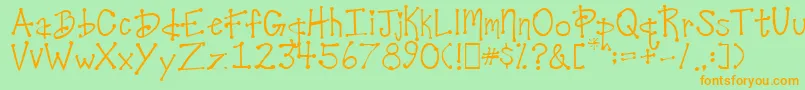 フォントDesireesCoolDots – オレンジの文字が緑の背景にあります。