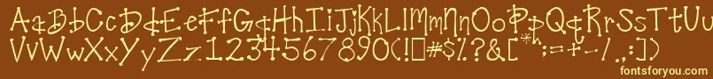 DesireesCoolDots-fontti – keltaiset fontit ruskealla taustalla