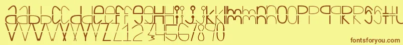 Cortadaフォントについての詳細 フォントCortada – 茶色の文字が黄色の背景にあります。