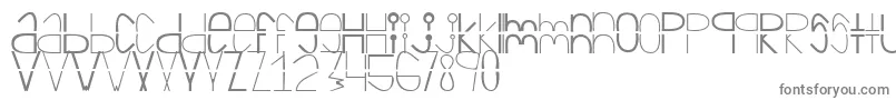 Cortada-fontti – harmaat kirjasimet valkoisella taustalla
