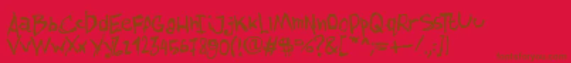 AmazhandFirstHard-Schriftart – Braune Schriften auf rotem Hintergrund