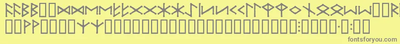 IceEggFutharkRegular-fontti – harmaat kirjasimet keltaisella taustalla