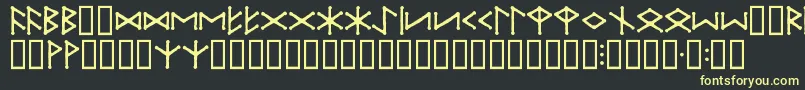 フォントIceEggFutharkRegular – 黒い背景に黄色の文字