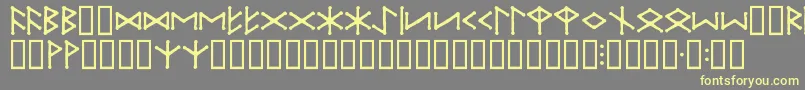 フォントIceEggFutharkRegular – 黄色のフォント、灰色の背景