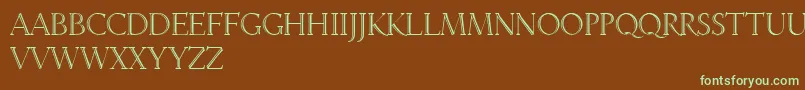 フォントLinotypeveneziaInitiale – 緑色の文字が茶色の背景にあります。