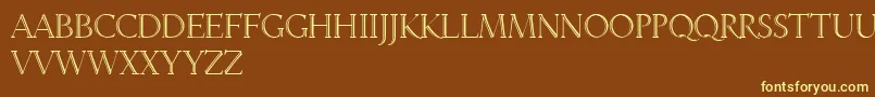 LinotypeveneziaInitiale-fontti – keltaiset fontit ruskealla taustalla