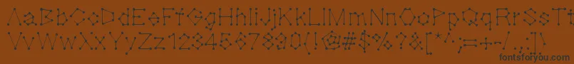 Dotnation Font – Black Fonts on Brown Background