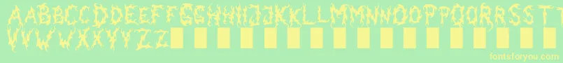 フォントDarkGarden – 黄色の文字が緑の背景にあります