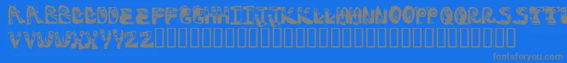 Monstocaps Font – Gray Fonts on Blue Background