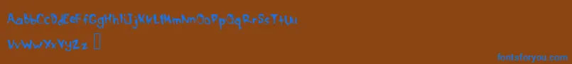 DrippymcdripNm Font – Blue Fonts on Brown Background