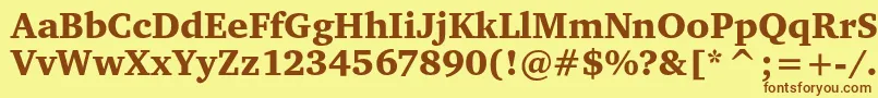 フォントCharteritcblack – 茶色の文字が黄色の背景にあります。