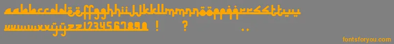 フォントRevolusiTimurTengah – オレンジの文字は灰色の背景にあります。