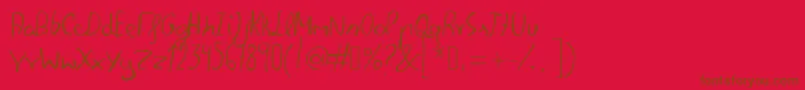 FelipescriptfontRegular-Schriftart – Braune Schriften auf rotem Hintergrund