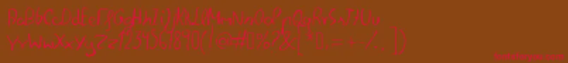 FelipescriptfontRegular Font – Red Fonts on Brown Background