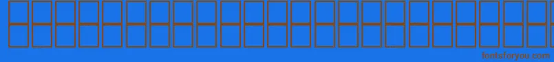 McsHor8SINormal2000 Font – Brown Fonts on Blue Background
