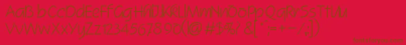SquireitcNormal-Schriftart – Braune Schriften auf rotem Hintergrund