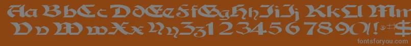 フォントTampicossk – 茶色の背景に灰色の文字