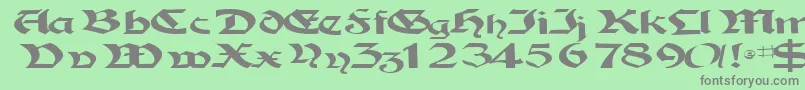 フォントTampicossk – 緑の背景に灰色の文字