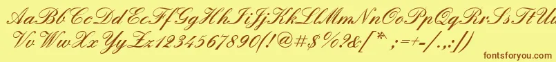 フォントQuadrillescriptblackssk – 茶色の文字が黄色の背景にあります。