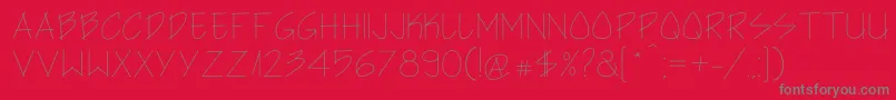 Шрифт ArchitectsHand – серые шрифты на красном фоне