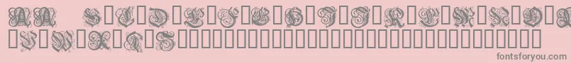 Fonte SevenWavesSighsSalome – fontes cinzas em um fundo rosa