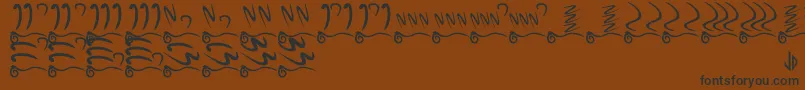 Abbai Font – Black Fonts on Brown Background