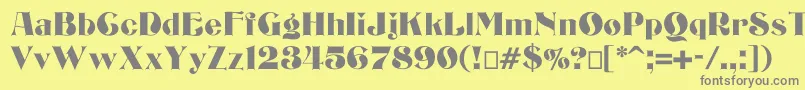 フォントBizarrerie – 黄色の背景に灰色の文字