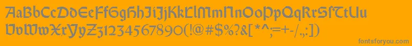 RundgotischRegular-Schriftart – Graue Schriften auf orangefarbenem Hintergrund